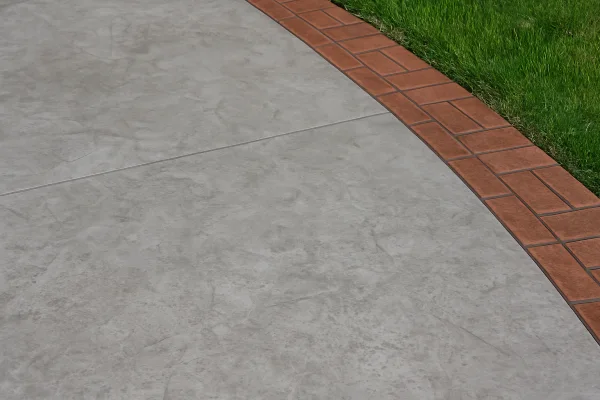 a section of a concrete patio from Concrete Contractor Hutto in Hutto, TX - Concrete Parking Lot Building a section of a concrete patio from Concrete Contractor Hutto in Hutto, TX - Concrete Parking Lot Building